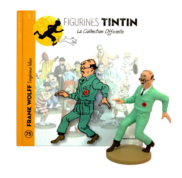 A painted resin figurine of Frank Wolff in pale green overalls with a red badge numbered 14, round glasses and a small moustache, caught mid-stride with his arms held out, in front of its booklet: Figurines Tintin, La Collection Officielle, no. 75, Frank Wolff, l'ingénieur félon, with the same pose drawn on the cover