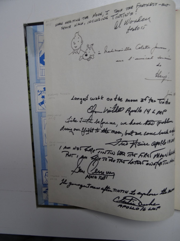Handwritten testimonies and signatures from Apollo astronauts in Explorers on the Moon album