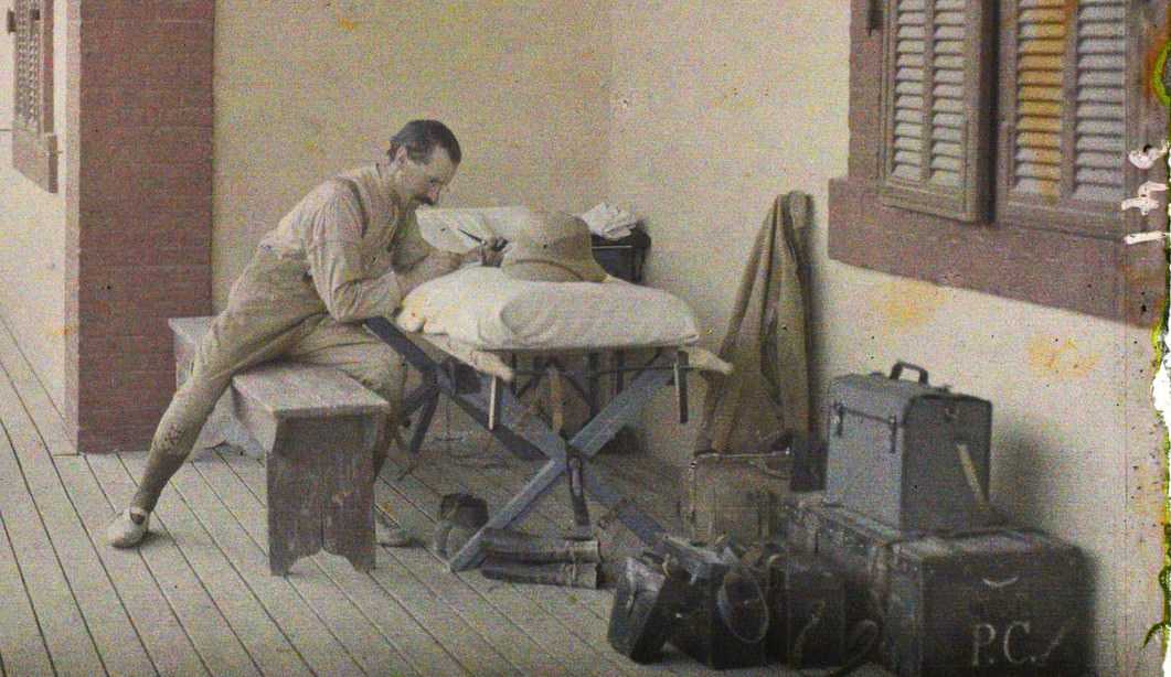 Autochrome portrait of photographer Paul Castelnau with camera equipment in Ismaïlia 1918